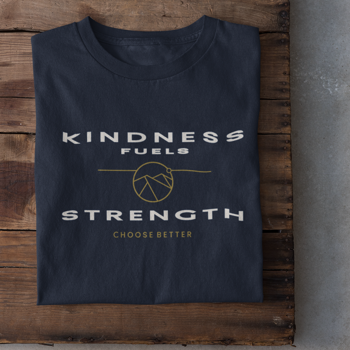 KINDNESS FUELS STRENGTH EMBLEM PREMIUM T-SHIRT