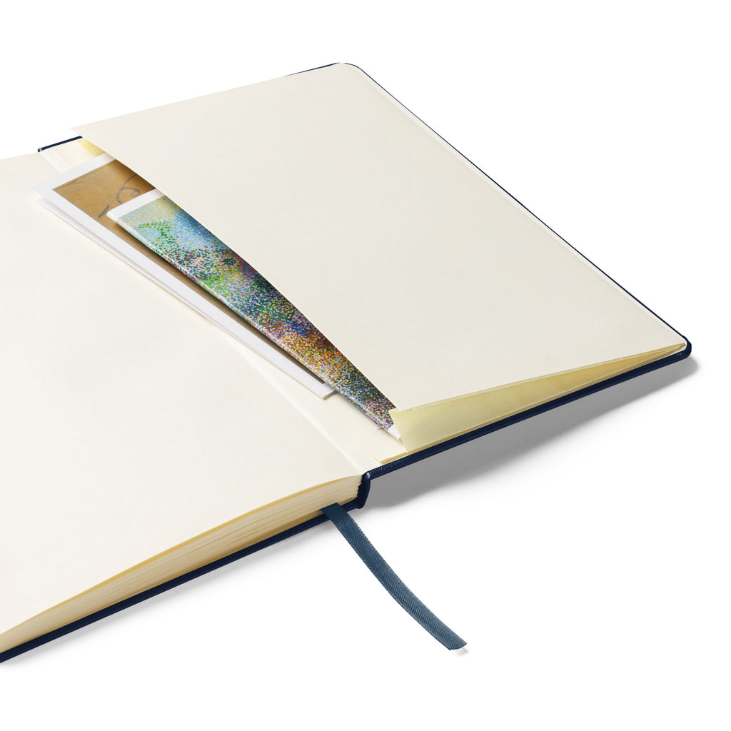 Open notebook with a phone inside on a white background